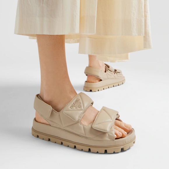 サンダル・ミュール PRADA Sand Nappa Leather Sandals Prada 65mm Padded Sandals | Neutrals | FARFETCH